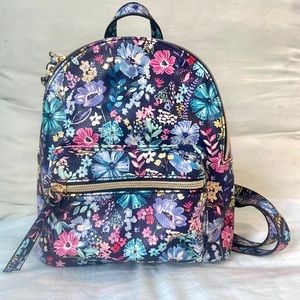 the cutest little backpack with floral prints!